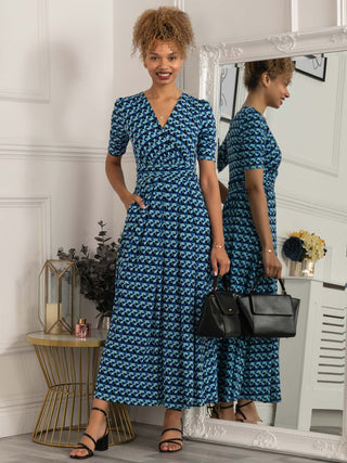 blue dress maxi, blue maxi dress, blue dress with sleeves, blue dress uk, blue dress with sleeves, sleeved dress, blue maxi dress with sleeves, blue maxi dress for wedding, blue maxi wedding guest, wedding guest, wedding guest dress, geometric print dress, geometric print maxi dress, dress with sleeves, sleeved dress, jersey maxi dress, jersey dress for women
